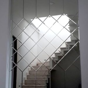 Beveled mirror feature wall design